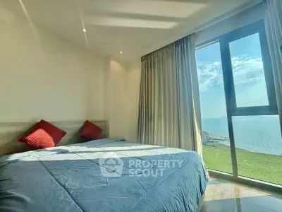 Bright bedroom with stunning sea view and modern decor