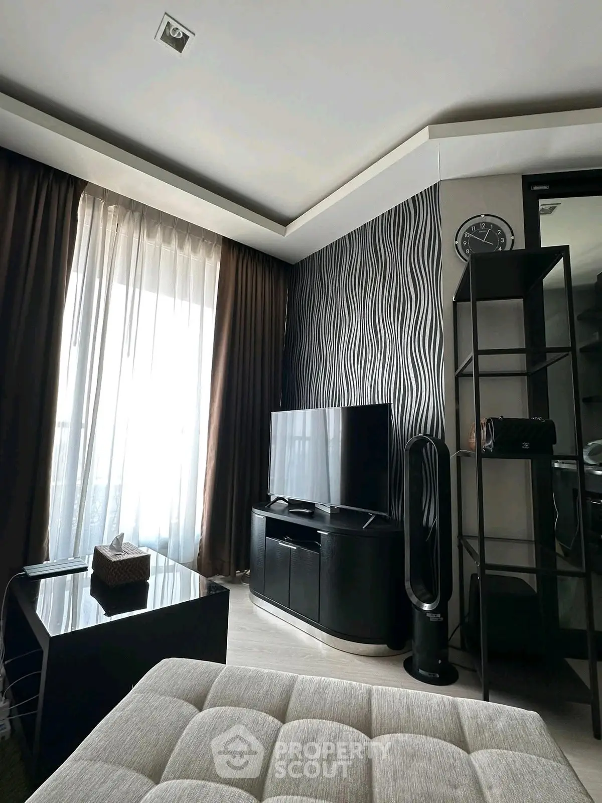 Modern living room with stylish decor and natural light