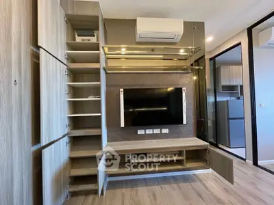 Modern living room with built-in entertainment center and air conditioning