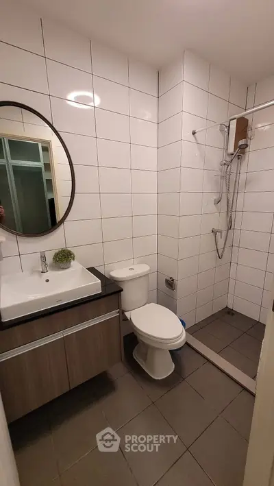 Modern bathroom with sleek fixtures and stylish tile design