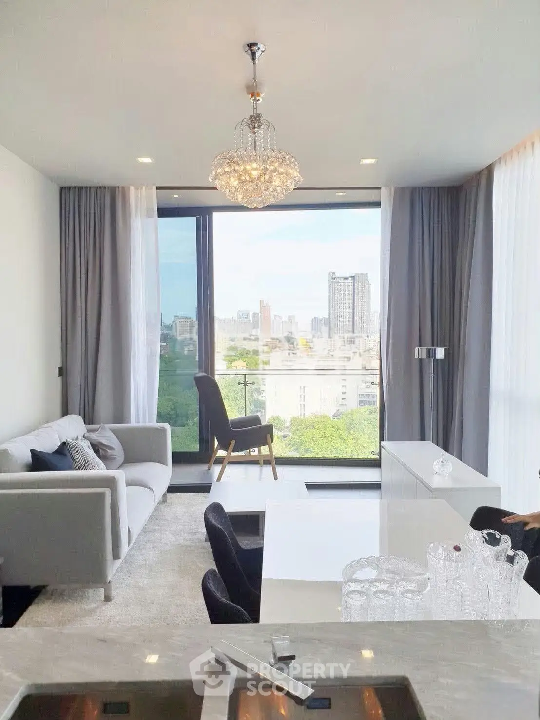 Luxurious living room with stunning city view and elegant decor