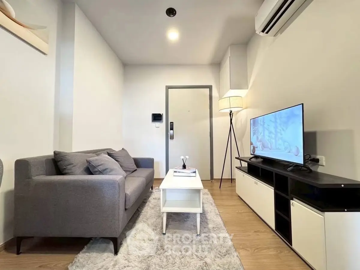 Modern living room with sleek furniture and cozy ambiance