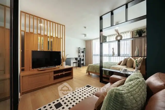 Modern open-plan living room with stylish decor and cozy seating area