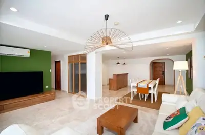 Spacious modern living room with stylish decor and open dining area