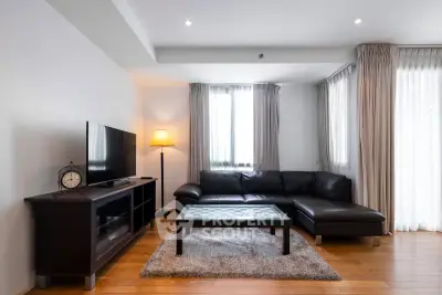 Spacious modern living room with sleek furniture and natural light