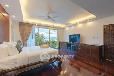 Luxurious bedroom with stunning view and elegant wooden flooring