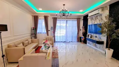 Luxurious living room with elegant chandelier and modern decor