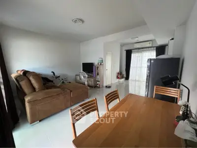Spacious living room with modern furniture and natural light