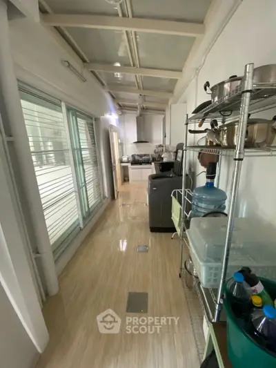 Spacious kitchen with modern appliances and ample storage space