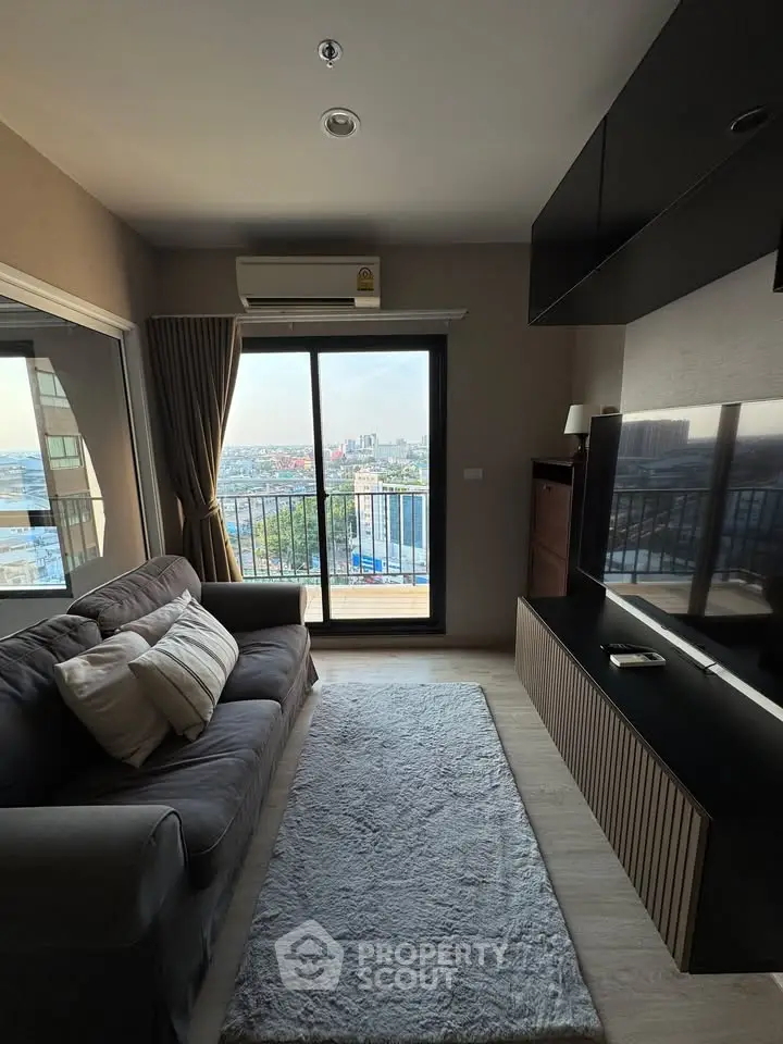 Cozy living room with balcony view and modern decor
