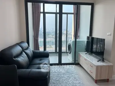 Modern living room with balcony view and washing machine