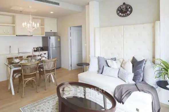 Chic modern living room with open kitchen and elegant dining area