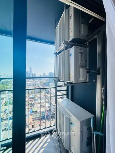 High-rise balcony with city view and air conditioning units, perfect for urban living.