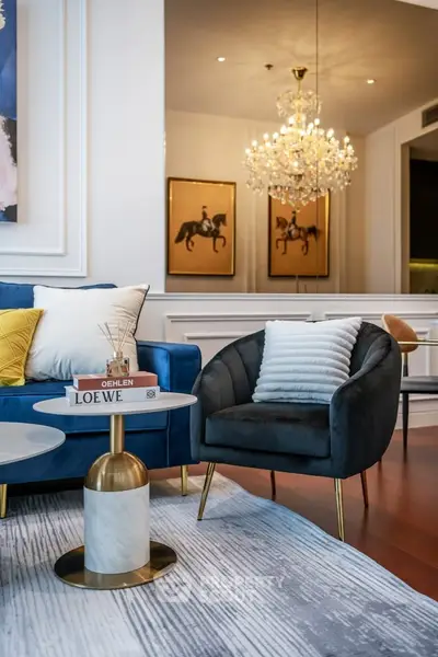 Luxurious living room with elegant chandelier and stylish furniture
