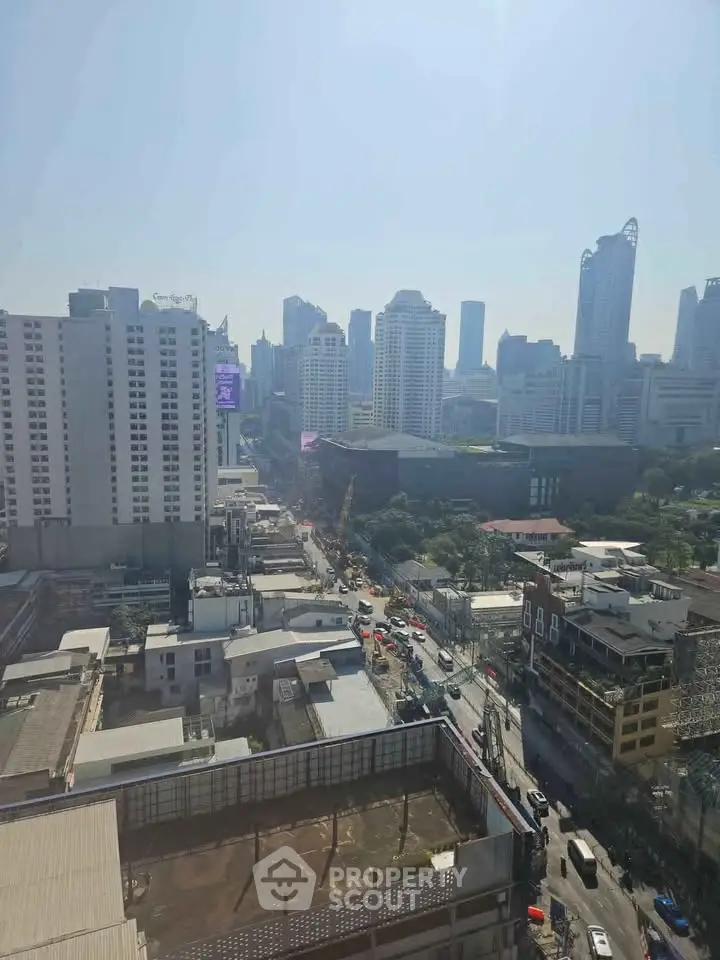 Stunning cityscape view showcasing modern skyscrapers and bustling urban life, perfect for real estate investment.