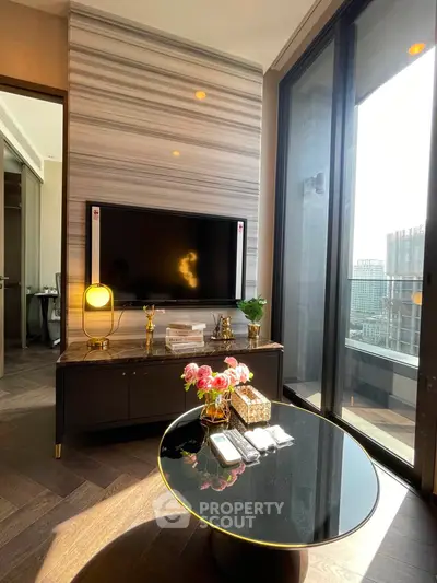Luxurious living room with modern decor and city view balcony, perfect for urban living.