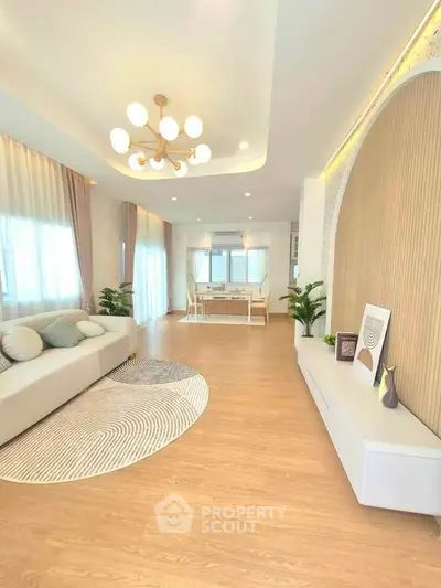 Spacious modern living room with elegant decor and natural light