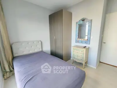 Cozy bedroom with elegant decor and ample storage space