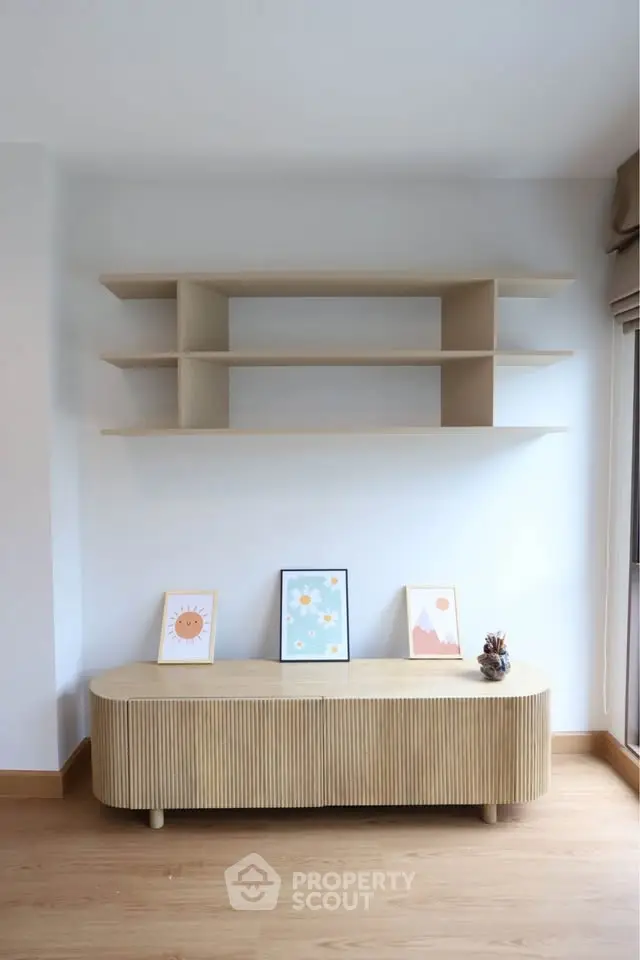 Modern minimalist living room with wooden shelves and stylish decor
