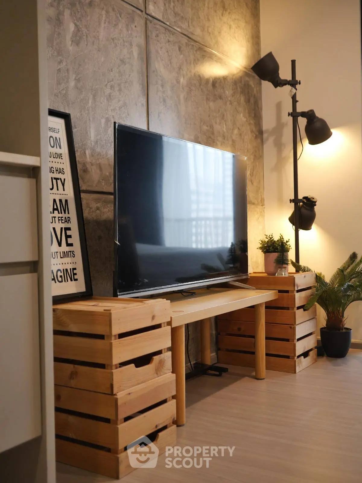 Modern living room with stylish TV setup and industrial decor