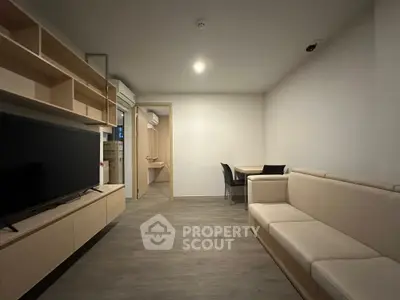 Modern living room with sleek furniture and open layout, perfect for contemporary living.