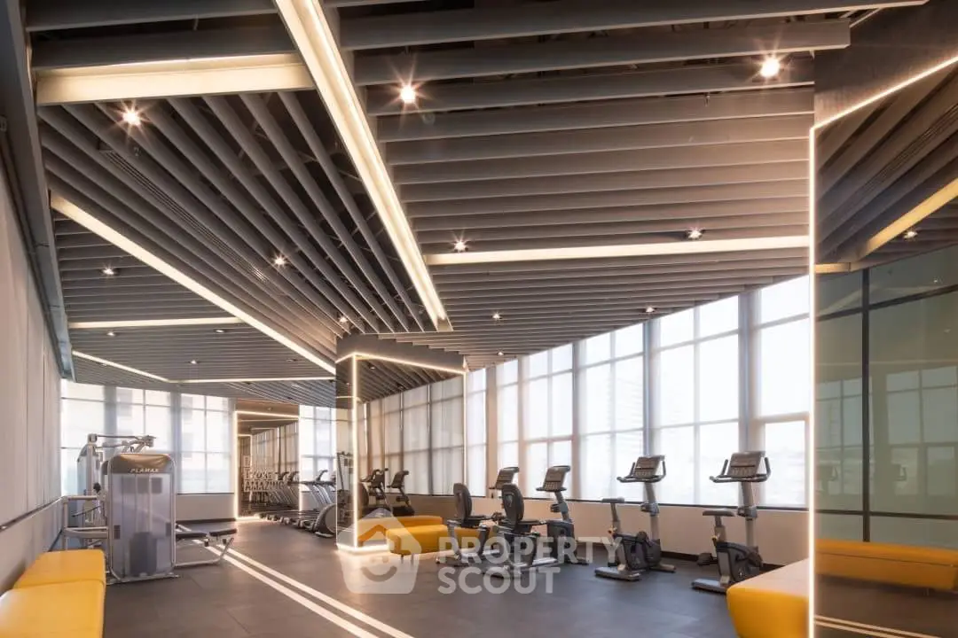 Modern gym with state-of-the-art equipment and stylish interior design.