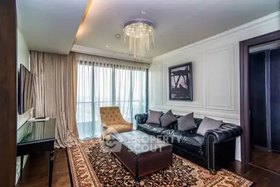 Luxurious living room with elegant chandelier and classic decor