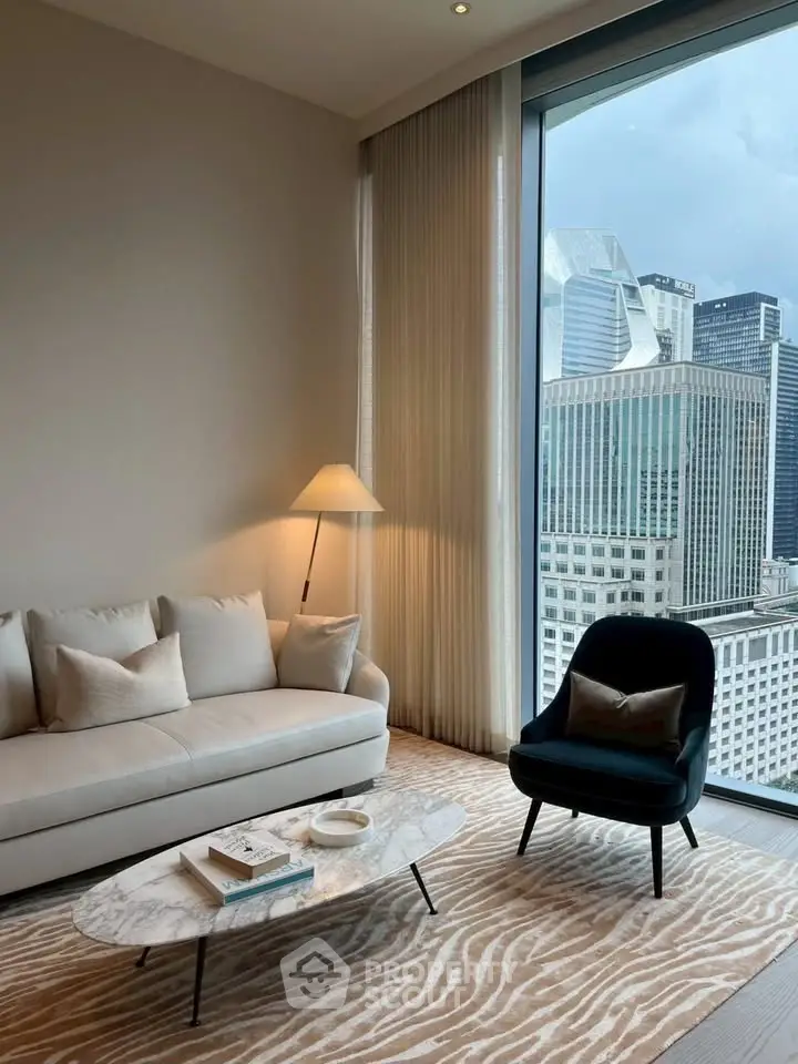 Luxurious living room with stunning city view, featuring elegant furniture and floor-to-ceiling windows.