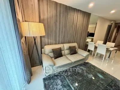 Modern living room with elegant decor and cozy seating area