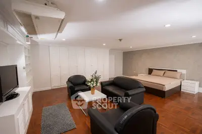 Spacious studio apartment with modern furnishings and elegant decor