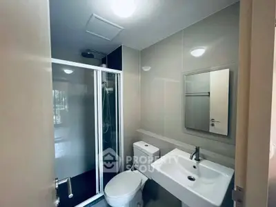 Modern bathroom with sleek shower and contemporary fixtures