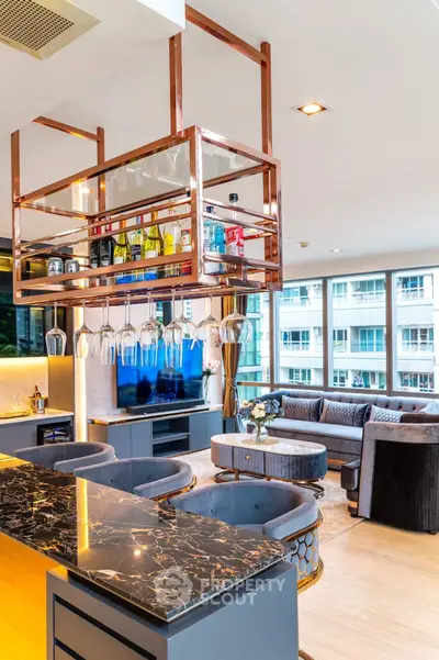 Luxurious modern living room with elegant bar and large windows