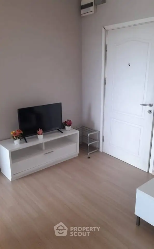 Modern living room with sleek TV stand and minimalist decor
