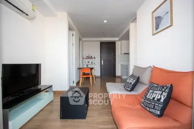 Modern living room with stylish furniture and open layout in a contemporary apartment.