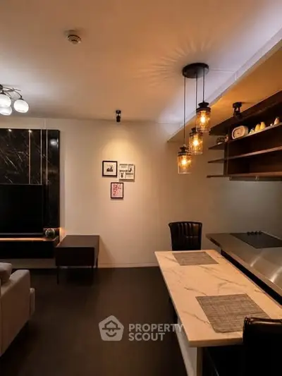 Modern living room with stylish lighting and sleek furniture, perfect for contemporary living.