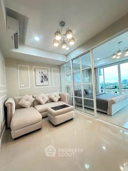 Luxurious living room with elegant decor and spacious bedroom view