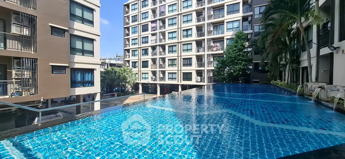 Luxurious condominium with stunning pool and modern architecture