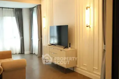 Elegant living room with modern TV stand and stylish lighting