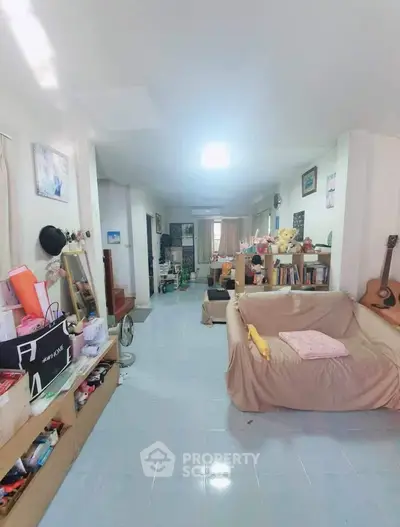 Spacious living room with cozy seating and natural light