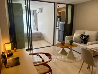 Modern studio apartment with open layout and stylish furnishings.