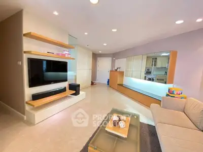 Spacious modern living room with sleek design and ample natural light.