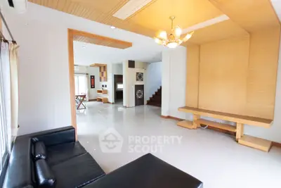 Spacious modern living room with elegant lighting and open layout