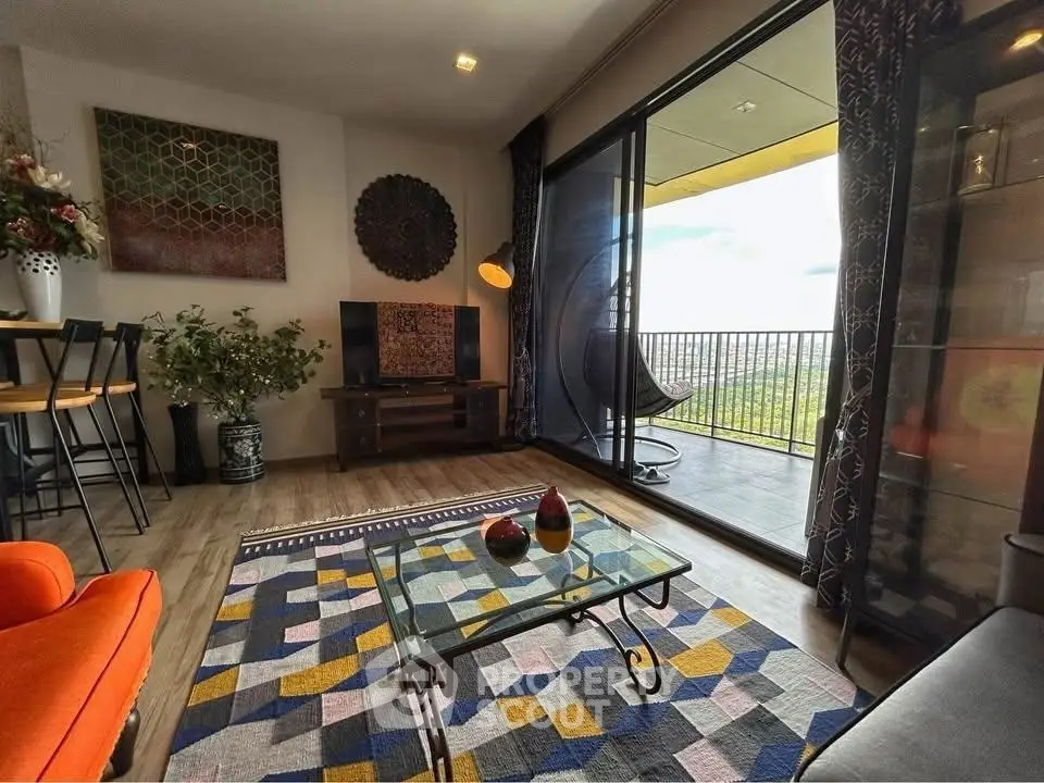 Stylish living room with vibrant decor and balcony view