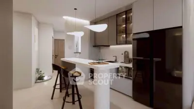 Modern kitchen with sleek design, featuring a breakfast bar, stylish lighting, and high-end appliances.