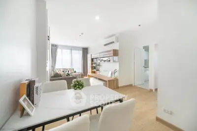 Bright and modern living room with dining area and stylish decor