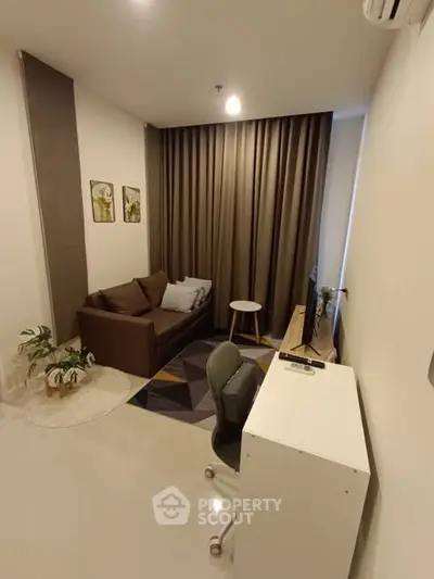 Cozy living room with modern decor and comfortable seating