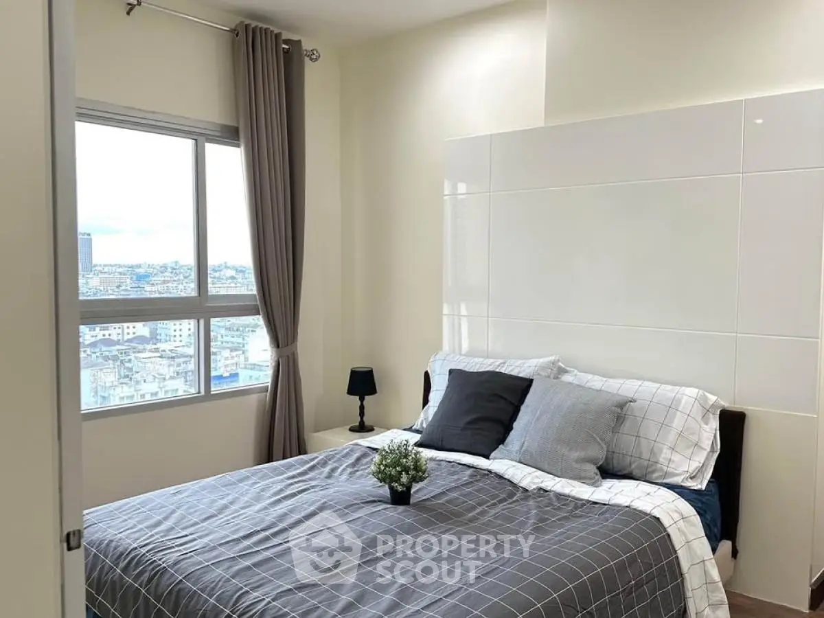 Cozy bedroom with city view and modern decor