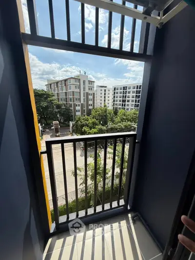Charming balcony with city view in modern apartment complex