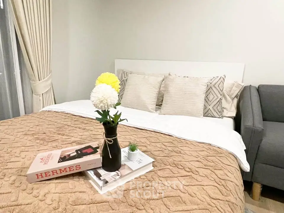 Cozy bedroom with stylish decor and plush bedding, perfect for relaxation and comfort.