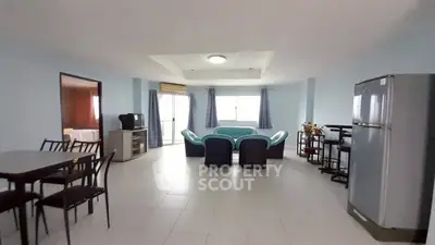 Spacious living room with modern furniture and natural light